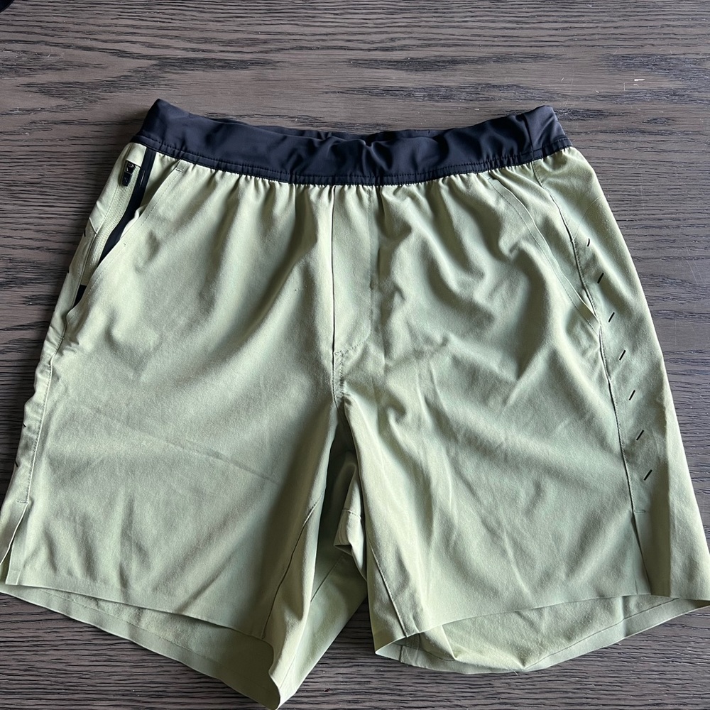 Mens ten thousand interval short medium 7”, no liner, color is OD Green